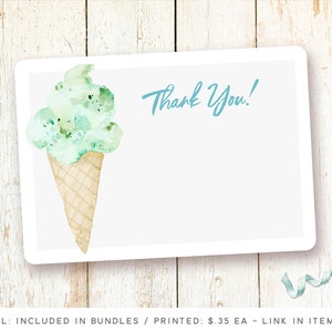 May include: A white card with a watercolor illustration of a green ice cream cone. The text "Thank You!" is written in blue on the card.
