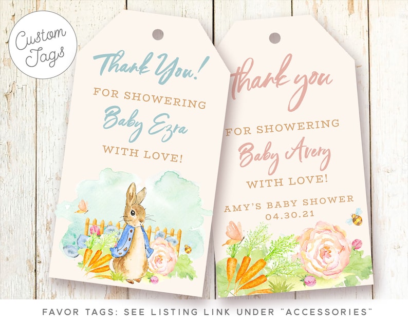 May include: Two pink and white baby shower favor tags with a watercolor illustration of a bunny rabbit and carrots. The text on the tags reads "Thank You! For Showering Baby Ezra With Love!" and "Thank You! For Showering Baby Avery With Love! Amy's Baby Shower 04.30.21".