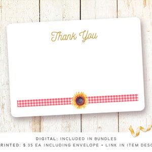 May include: A blank thank you card with a red and white gingham ribbon and a sunflower graphic. The text "Thank You" is printed in gold at the top of the card. The card is on a white wood background.