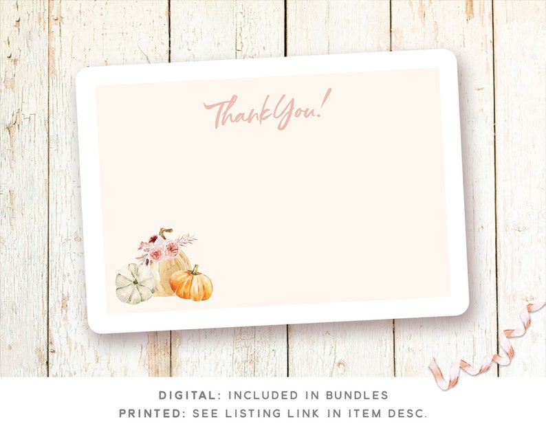 May include: A pink thank you card with a watercolor illustration of pumpkins and flowers. The text "Thank You!" is written in pink script. The card is on a white wood background.