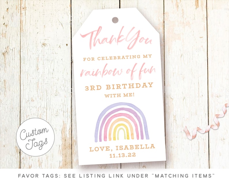 May include: A white thank you tag with a rainbow design and the text "Thank You for celebrating my rainbow of fun 3rd Birthday with me! Love, Isabella 11.13.22".