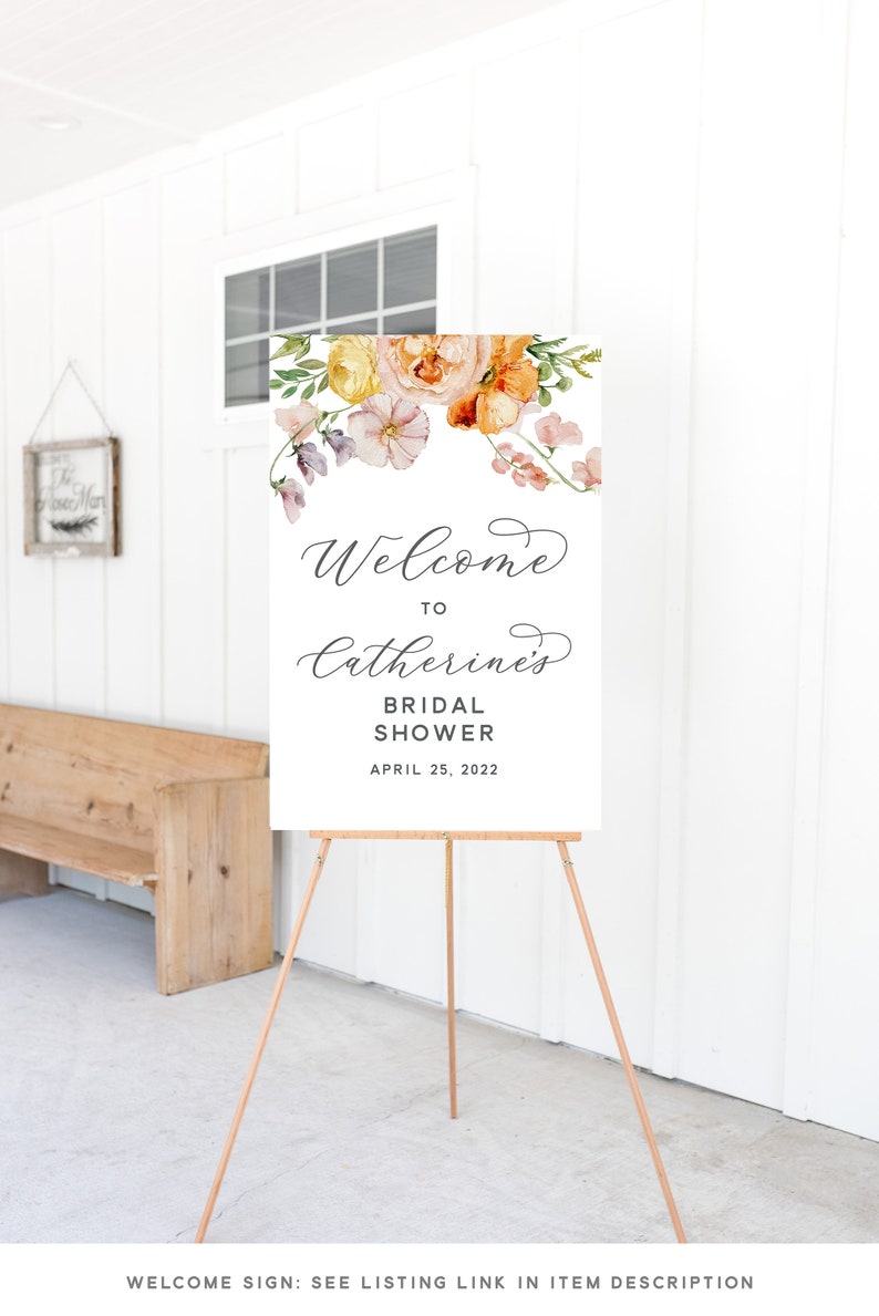 Peut inclure: Une pancarte de bienvenue pour une f&ecirc;te de mariage avec un motif floral dans les tons orange, jaune et rose. La pancarte indique "Bienvenue &agrave; Catherine's Bridal Shower le 25 avril 2022".