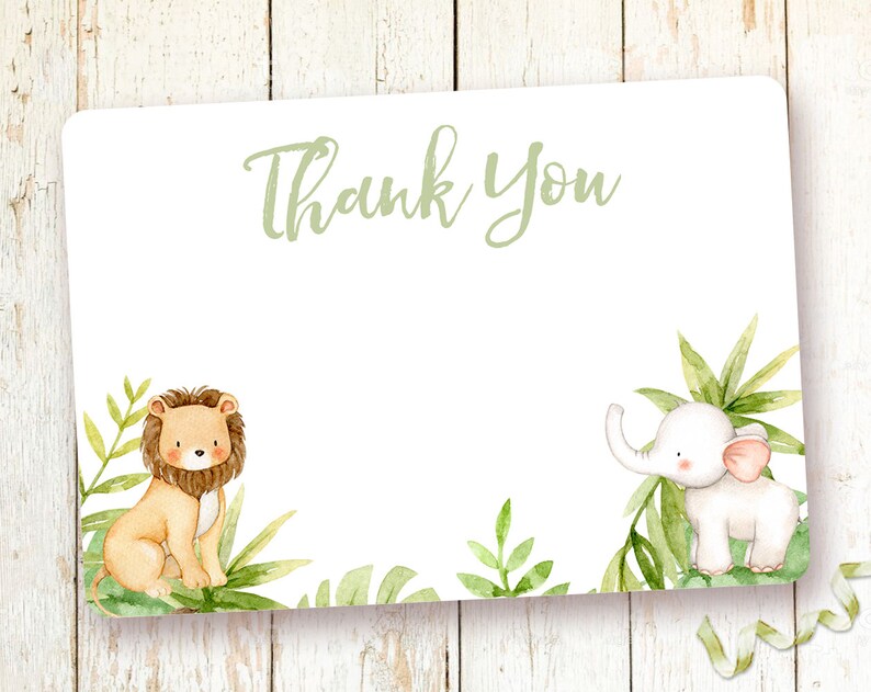 May include: A white thank you card with green foliage and a lion and elephant illustration. The text "Thank You" is written in green.