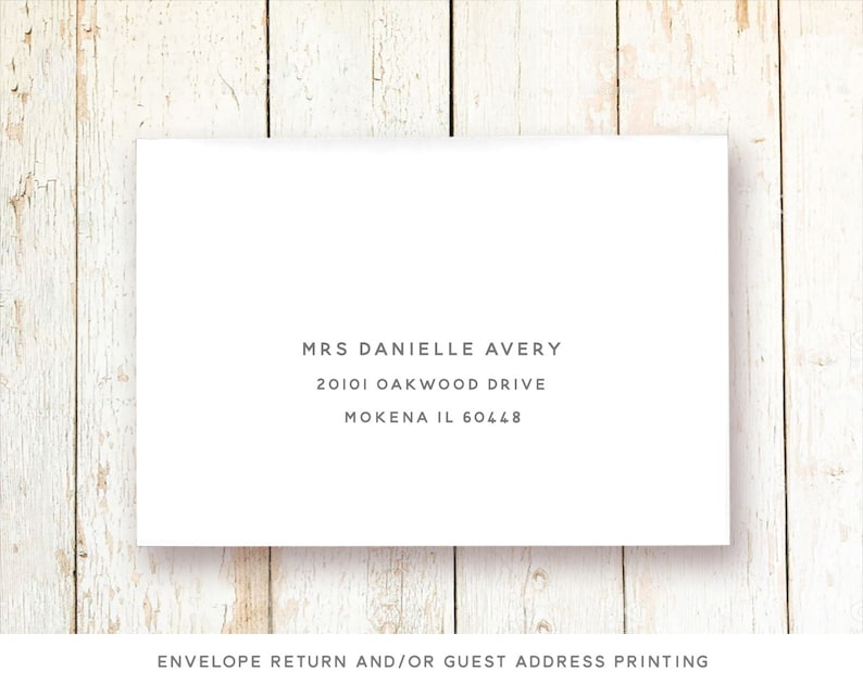 May include: White envelope with a printed address for Mrs. Danielle Avery, 20101 Oakwood Drive, Mokena IL 60448. The text "ENVELOPE RETURN AND/OR GUEST ADDRESS PRINTING" is printed below the address.