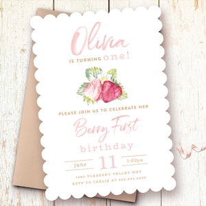 May include: A pink and white invitation with a watercolor illustration of strawberries. The text reads "Olivia is turning one!" and "Berry First birthday". The date is June 11th at 3:00pm. The address is 1280 Pleasant Valley Way and the RSVP information is to Carlie at 555.243.2233.