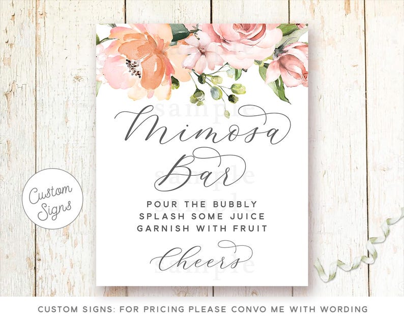 May include: A printable sign with a floral design in shades of pink and peach. The sign says "Mimosa Bar" and includes instructions to "Pour the bubbly, splash some juice, garnish with fruit, Cheers".