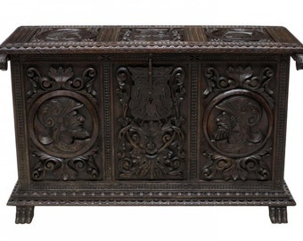 Elaborately Carved 19th Century Spanish Trunk with Armour Helmeted Busts