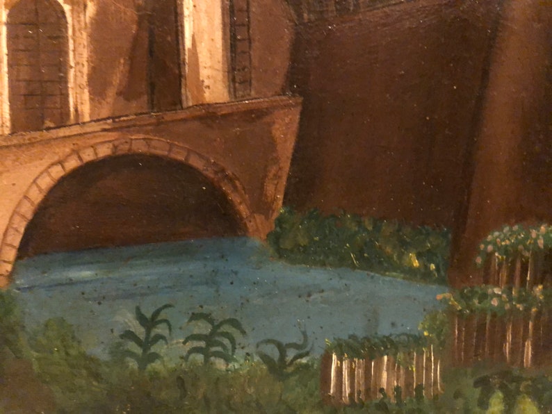 May include: A painting of a bridge over a blue river with green foliage and a brown building in the background.
