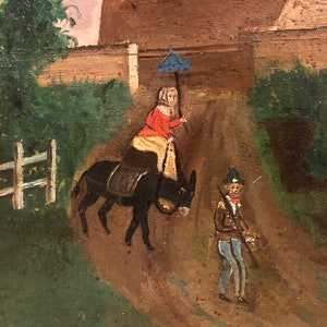 May include: A painting depicting a woman riding a donkey down a dirt road. The woman is wearing a red dress and a blue hat. She is holding an umbrella. A man in a blue uniform is walking behind her. The painting is set in a rural landscape with a white picket fence and green trees.