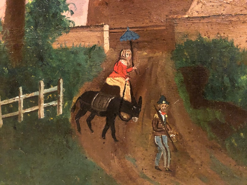 May include: A painting depicting a woman riding a donkey down a dirt road. The woman is wearing a red dress and a blue hat. She is holding an umbrella. A man in a blue uniform is walking behind her. The painting is set in a rural landscape with a white picket fence and green trees.