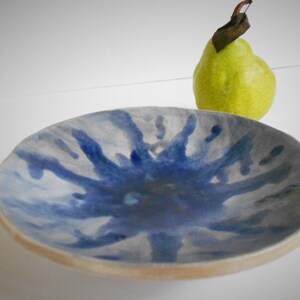 Handmade blue white pottery bowl with organic shape and textured underside image 6