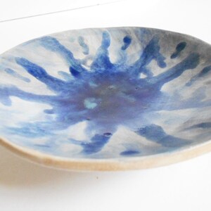 Handmade blue white pottery bowl with organic shape and textured underside image 7