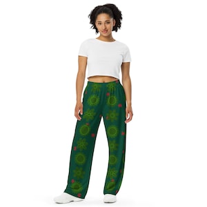 Unisex pants flowers dark green with wide legs and side pockets