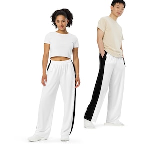 Unisex pants white with wide legs and side pockets, as well as black side stripes