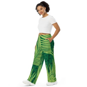 Unisex pants Green leaves with a wide leg and side pockets