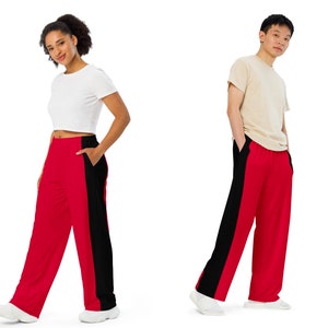Unisex trousers jogging pants in red with black side stripes, wide legs and side pockets