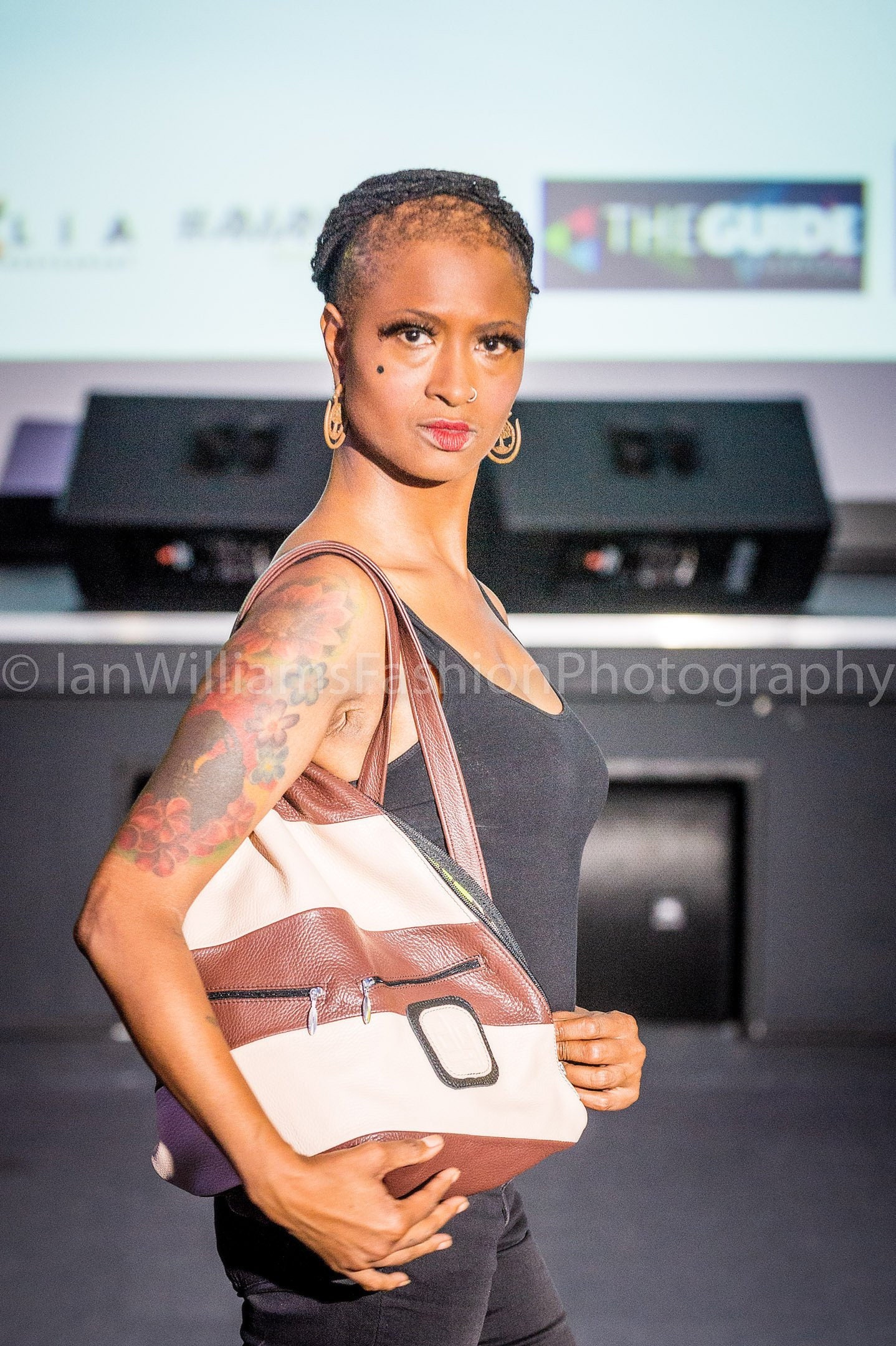 striped leather backpack