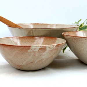 large nesting pottery bowls image 1