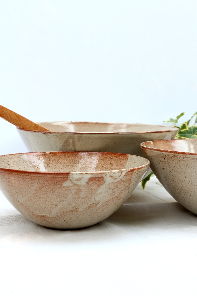 large nesting pottery bowls image 1