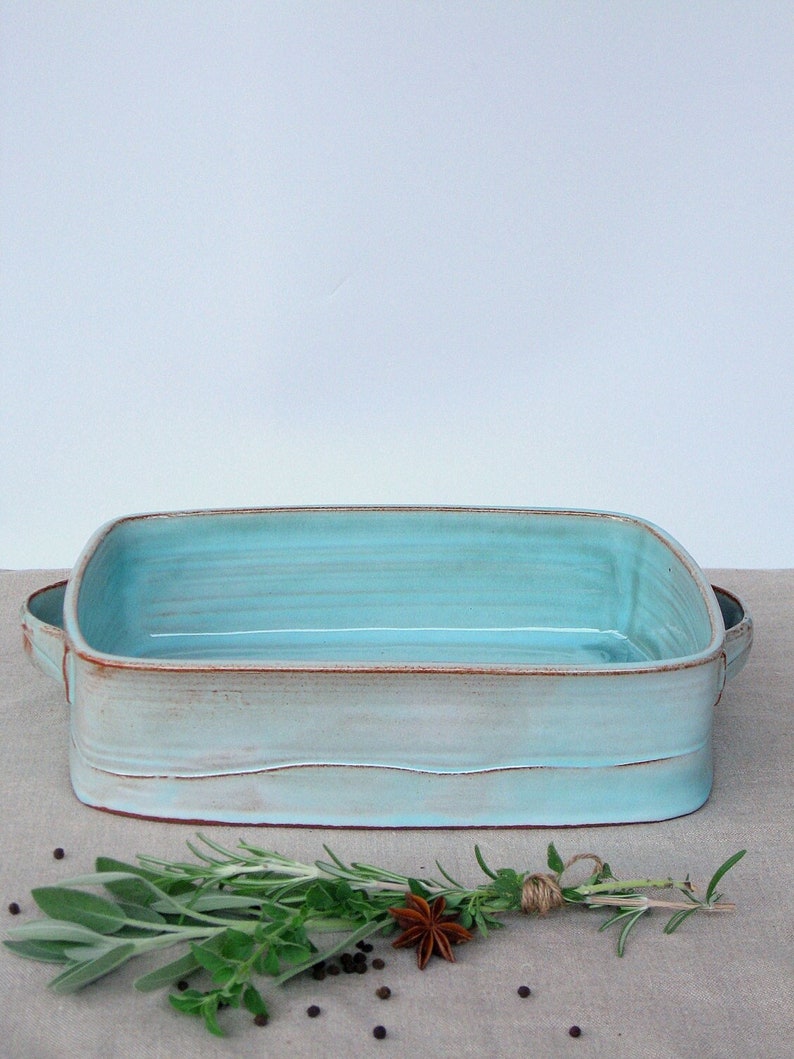 A handmade turquoise rectangle baking dish