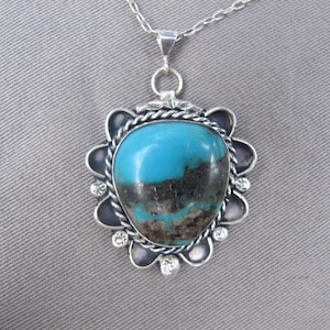 Vintage Navajo turquoise sterling silver pendant