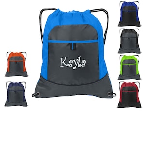 May include: A blue and gray drawstring backpack with a front pocket and the name "Kayla" embroidered on the front. The backpack is shown with several other color options.