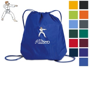 May include: Blue drawstring bag with a white karate kid graphic and the name Allison embroidered on it. The bag is shown against a white background with a color chart of different bag colors.