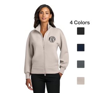 May include: A beige zip-up jacket with a black monogram on the left chest. The jacket has a high collar and is shown with four color options: black, navy, gray, and beige. The text "4 Colors" is displayed.