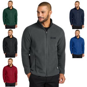 May include: A charcoal gray fleece jacket with a zipper closure and a black embroidered logo that says "Scott".