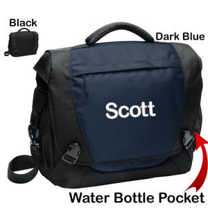 May include: A dark blue and black messenger bag with a zippered pocket and a water bottle pocket. The bag has a white embroidered name "Scott" on the front.