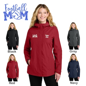 May include: A red hooded jacket with the text "Football Mom" and "Tyler #12". The image also shows the jacket in black, grey, and navy blue. The text "Football Mom" is in blue glitter.
