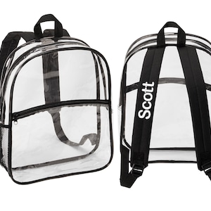 May include: Clear plastic backpack with black straps and a black zippered pocket. The backpack has a mesh pocket on the side and the name "Scott" is printed on the back strap in white.