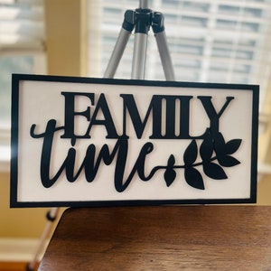 a) Family time laser 3D cut rectangular wood sign painted in black and white
