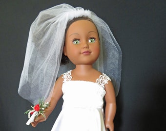 Wedding dress fits 18 inch dolls like American Girl w/lace shoulder straps on satin bodice with full skirt. Veil, flowers & shoes optional.