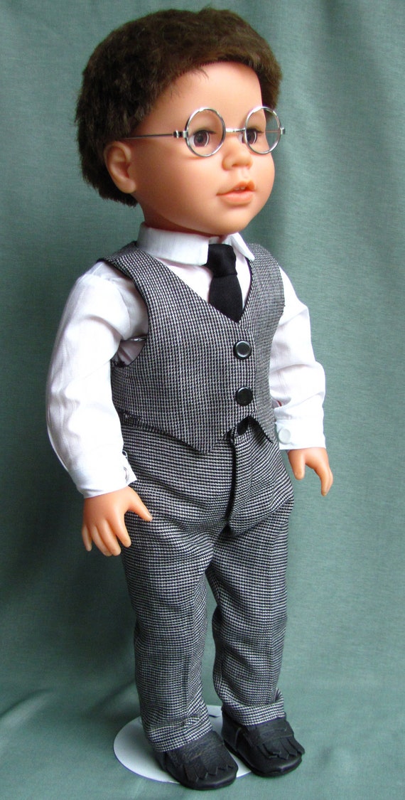 boy doll with glasses