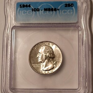 May include: A 1944 silver quarter coin, graded MS66+, encased in a clear plastic holder. The coin features a profile of a man and the words "IN GOD WE TRUST" and "LIBERTY". The coin is a 25-cent piece.