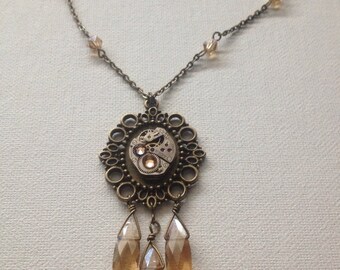 Steampunk Halskette mit orange Kristalle