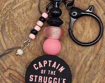 Llavero de silicona con cuentas para bolso del Capitán de la Lucha