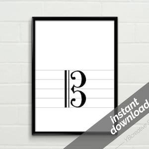 May include: Black and white printable music notation for a bass clef with the number 3 on a white background.