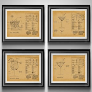 May include: Four framed vintage-style prints featuring cocktail blueprints. Each print showcases a different cocktail: Old Fashioned, Martini, Whiskey Sour, and Manhattan. The prints are in black frames with a tan background.