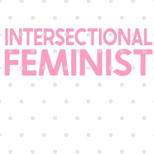 May include: Pink text on a white background with a gray polka dot pattern. The text reads "INTERSECTIONAL FEMINIST".