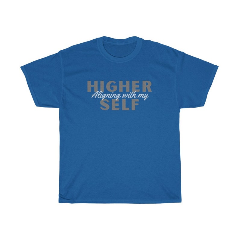May include: A royal blue t-shirt with the text "HIGHER Aligning with my SELF" in gray and white lettering.