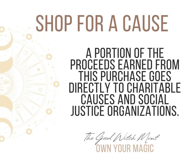 May include: A graphic with a sun and moon design and the text "SHOP FOR A CAUSE". The text below reads "A portion of the proceeds earned from this purchase goes directly to charitable causes and social justice organizations." The text at the bottom reads "The Good Witch Mont OWN YOUR MAGIC".