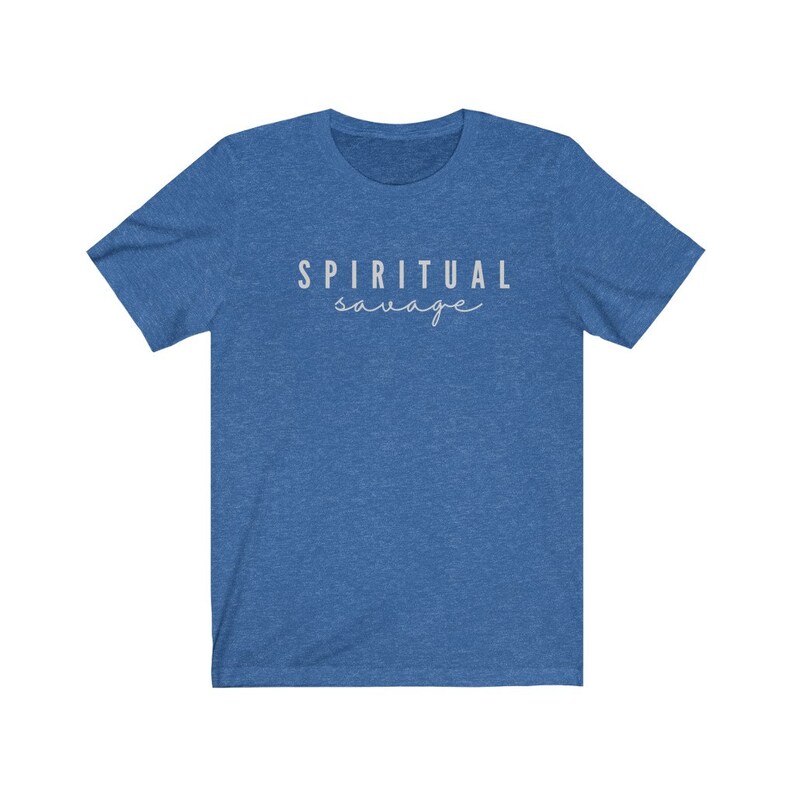 May include: Blue short-sleeve t-shirt with the words "SPIRITUAL savage" printed in light gray. The text is in a sans-serif font with the word "savage" in a cursive font.
