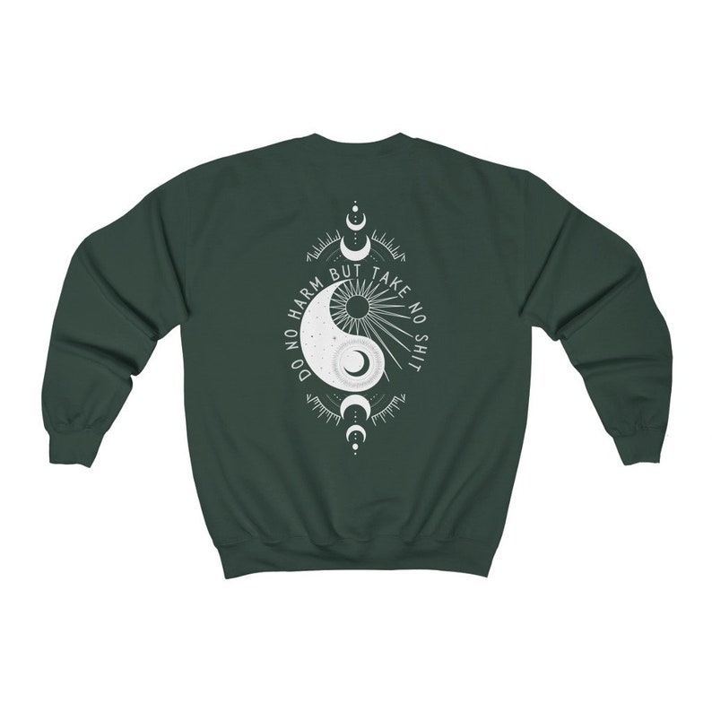 May include: A dark green sweatshirt with a white yin yang symbol and the text "Do no harm but take no shit" printed on the back.