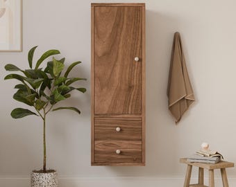 Mueble de baño de nogal con cajones para guardar ropa blanca