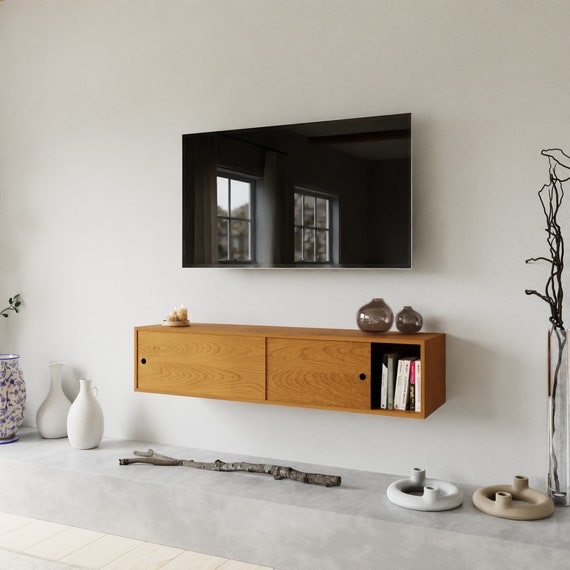 Floating tv on sale cabinet with doors