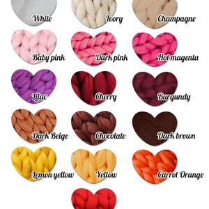 May include: A collection of heart-shaped swatches of chunky knit yarn in various colors, including white, ivory, pink, red, yellow, and brown. Each swatch has a color name written in a cursive font.