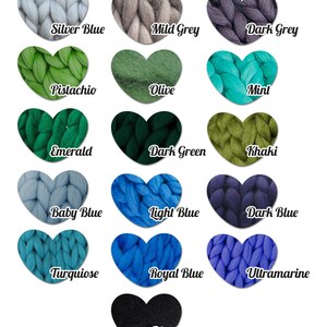 May include: A collection of heart-shaped swatches of chunky knit yarn in various colors, including silver blue, mild grey, dark grey, pistachio, olive, mint, emerald, dark green, khaki, baby blue, light blue, dark blue, turquoise, royal blue, ultramarine, and black. Each swatch has a color name.