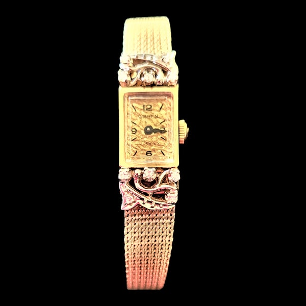 HUGE SALE Ladies vintage Gruen Dress watch14kt yellow gold case with ten single-cut diamonds set into a vine and leaf motif SALE lower Price